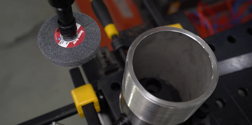 Wheel threaded tube deburring